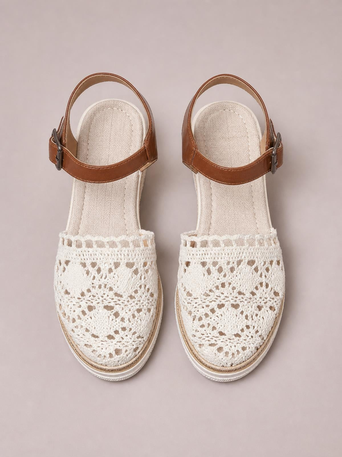 White mesh and PU leather round toe wedge sandals with crochet-style uppers, brown adjustable ankle straps, buckles, and mid-height wedge soles.