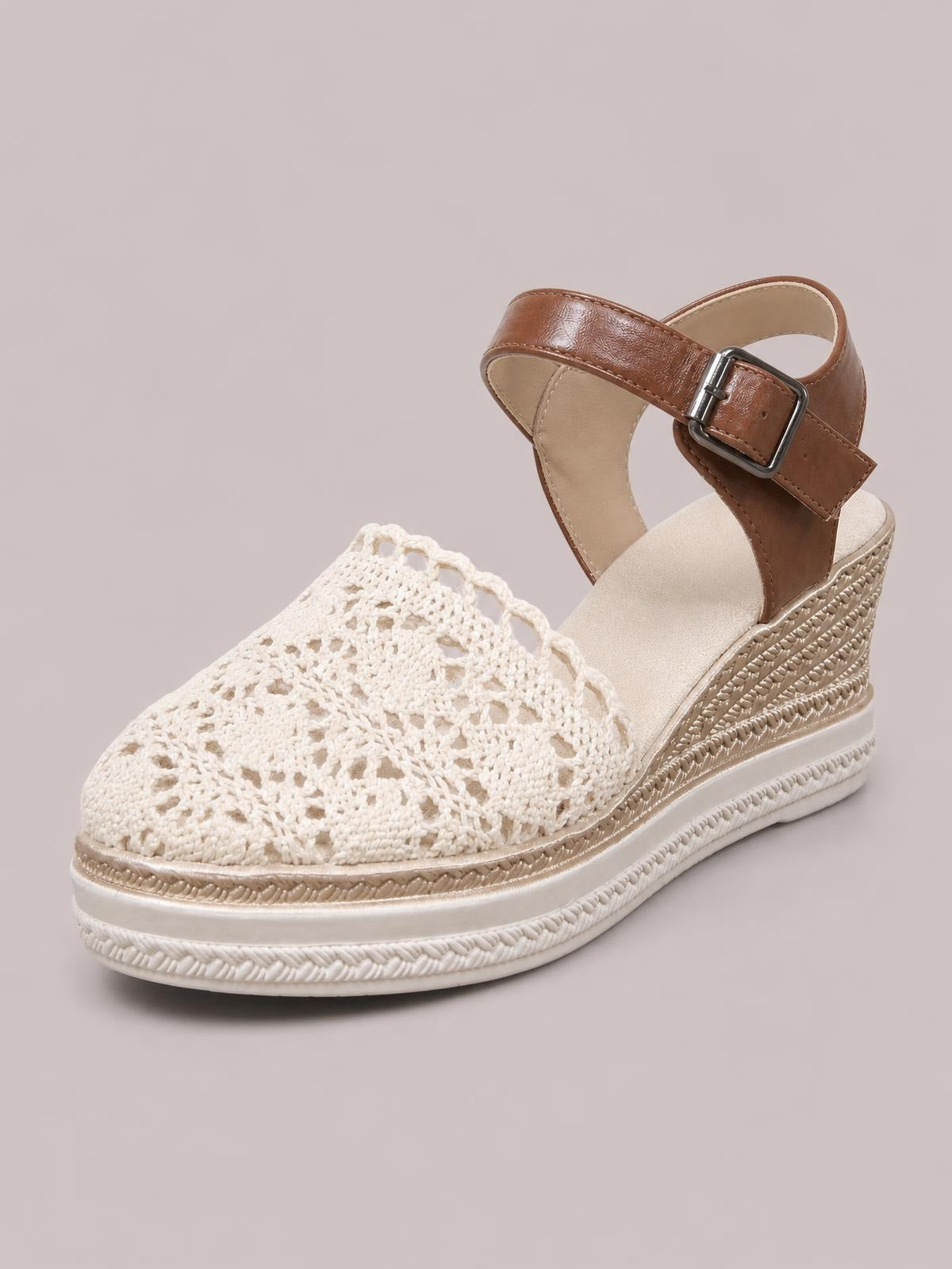 White mesh and brown PU leather round toe wedge sandal with a buckled ankle strap, mid-height wedge heel, and textured rubber platform sole.