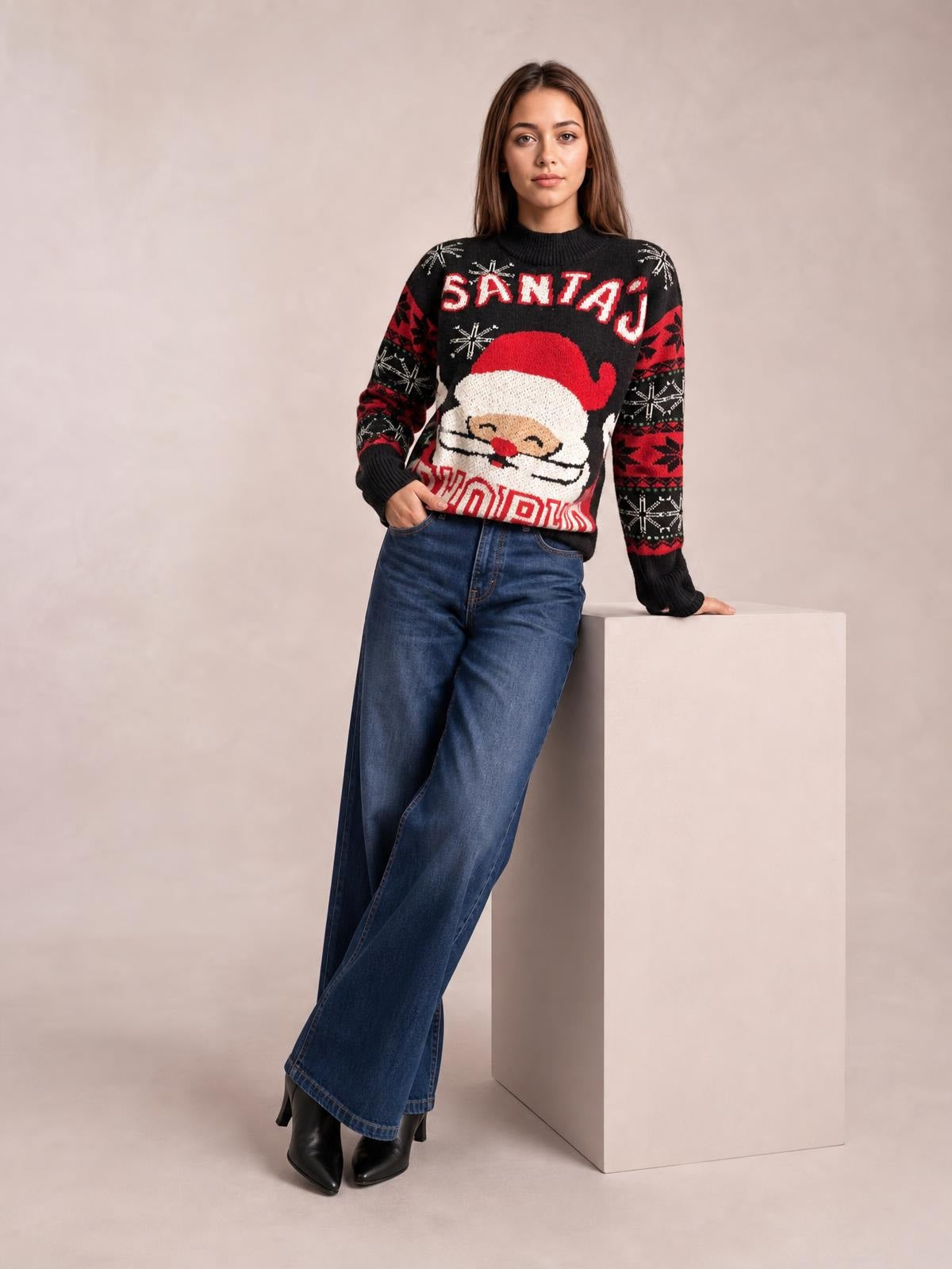 Model poses in a black Santa mock neck long sleeve sweater with ribbed trim, festive red-and-white graphic, and a relaxed silhouette.
