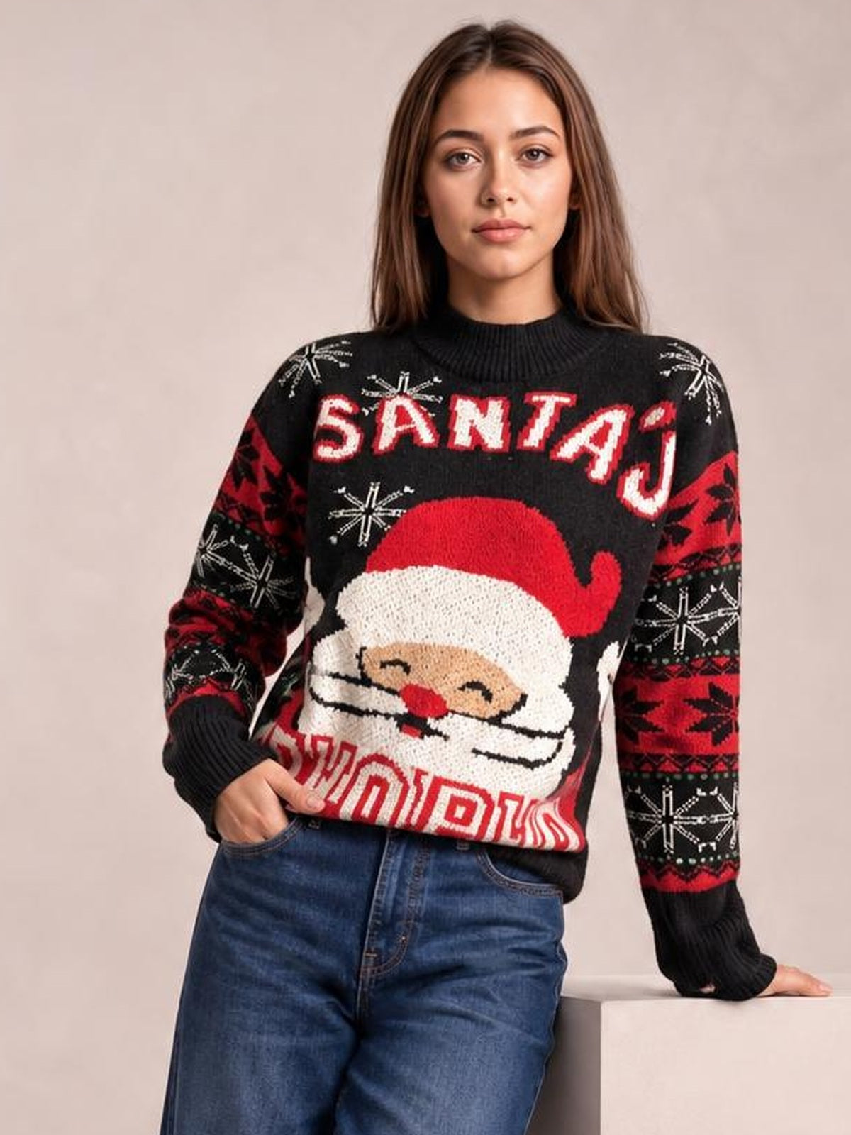A model wears a black Santa mock neck long sleeve sweater with a festive Santa graphic, red-and-white lettering, patterned sleeves, ribbed cuffs, and a relaxed silhouette.