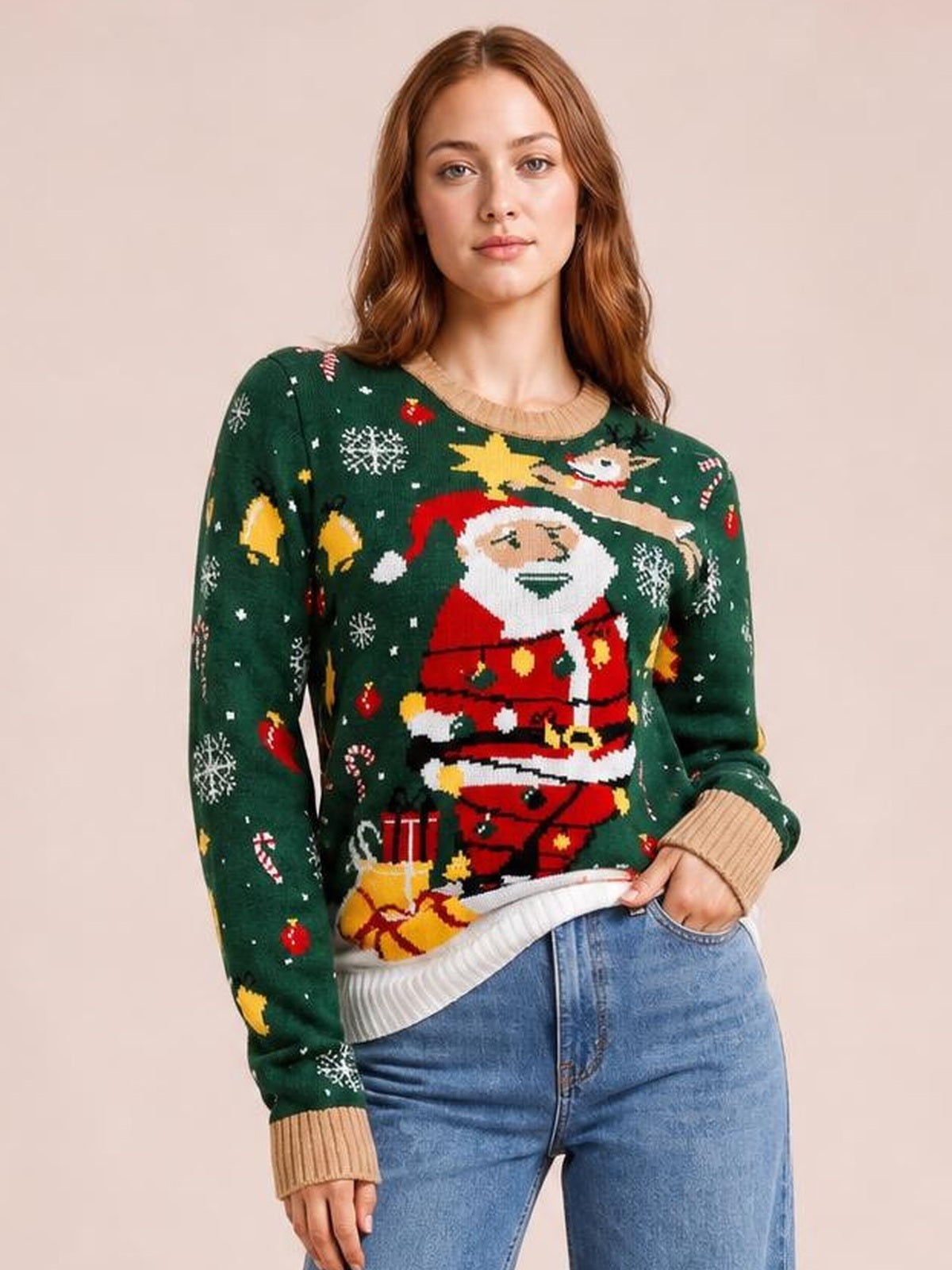 Model wearing a dark green Santa round neck long sleeve sweater with festive knit graphics, ribbed beige cuffs and hem, shown in a relaxed standing pose.