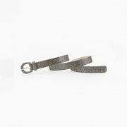 A slim gunmetal sequin PU leather belt with an allover textured finish, 1.1-inch width, and coordinated rounded buckle.