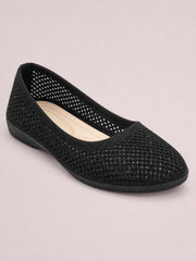 Black solid-color mesh flat slip-on shoe with a rounded toe, woven open-knit upper, low rubber sole, and cushioned beige insole.