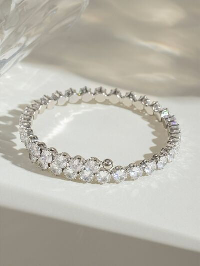 Stainless steel inlaid zircon bracelet in a silver-tone finish, featuring a circular silhouette with closely set round sparkling stones in linked settings.