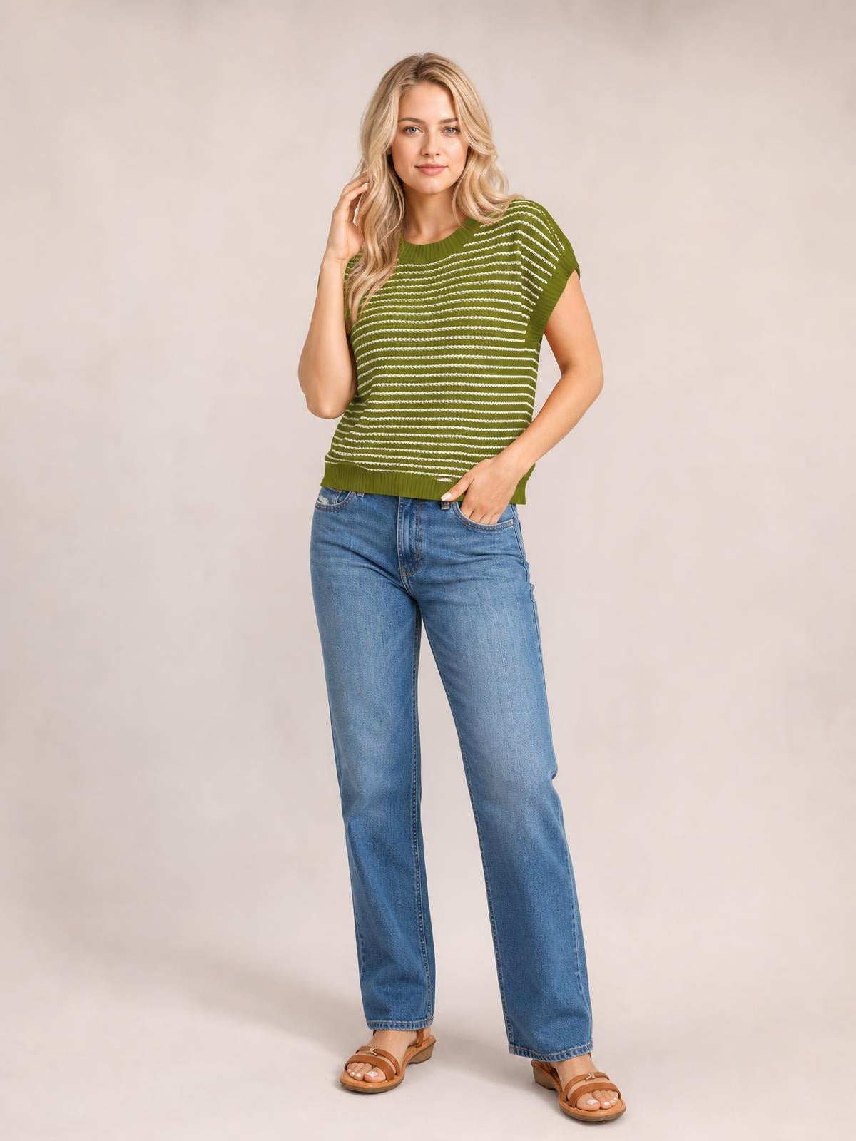 Model wears a green striped round neck short sleeve knit top with horizontal white stripes, a relaxed silhouette, and ribbed neckline and hem.