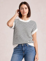 Model wearing a black-and-white striped round neck short sleeve knit top with a relaxed silhouette and ribbed neckline, cuffs, and hem.