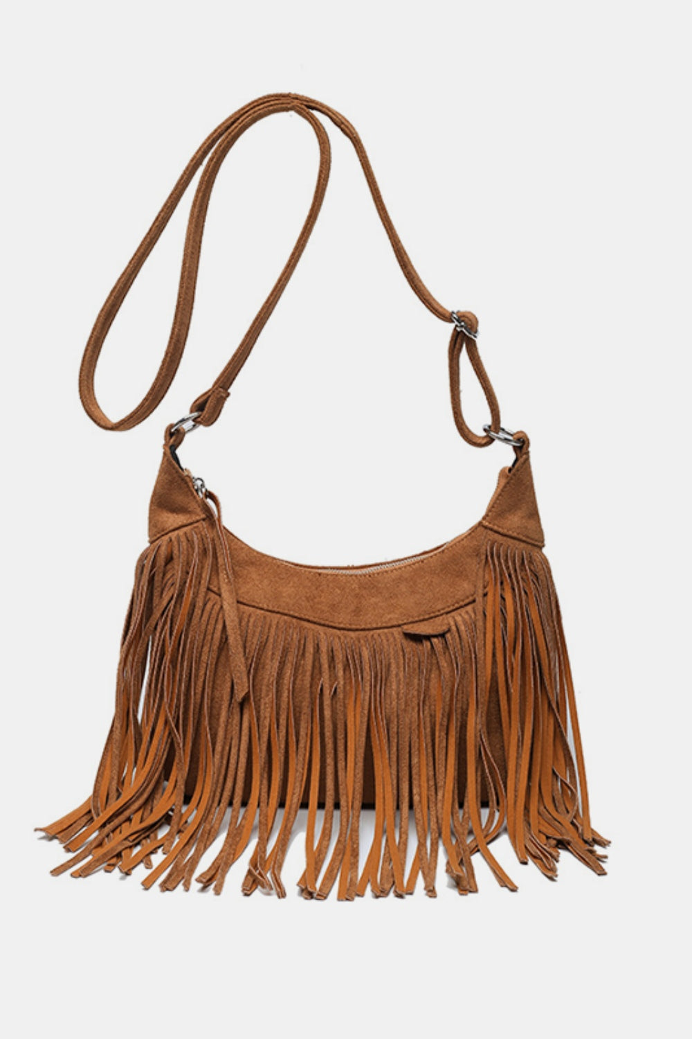 A small brown suede shoulder bag features a softly curved silhouette, long fluid fringe, and an adjustable strap with metal hardware.