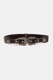 Black PU leather belt with a symmetrical double-buckle design, ornate zinc alloy hardware, punched holes, and a bold 1.5-inch waist-defining silhouette.