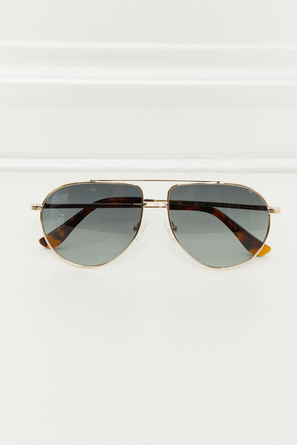 Dark gray TAC polarization lens aviator sunglasses feature a polished gold-tone metal frame, double bridge, and tortoiseshell acetate-and-metal temples.