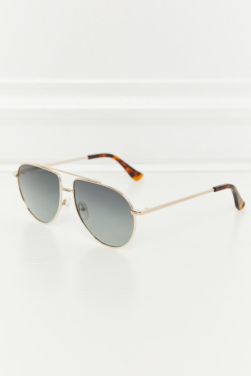 Dark gray TAC polarization lens aviator sunglasses feature a streamlined gold-tone metal frame, rounded teardrop lenses, and tortoiseshell acetate-metal temples.