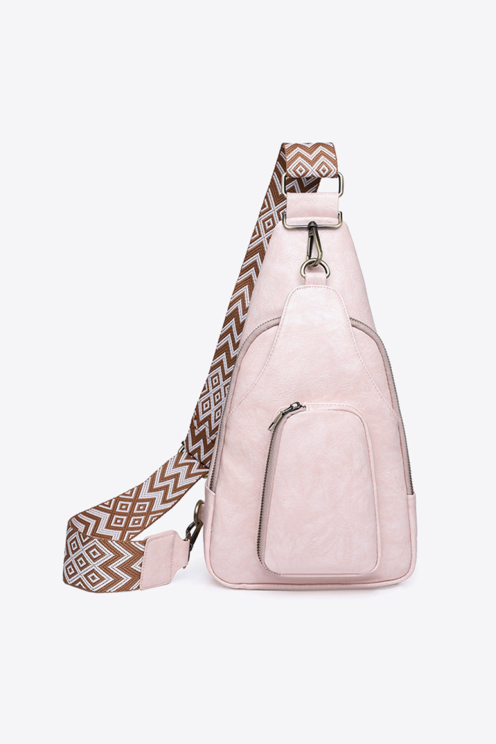 A compact pink PU leather sling bag features a streamlined silhouette, broad patterned shoulder strap, adjustable hardware, and a front zip pocket.