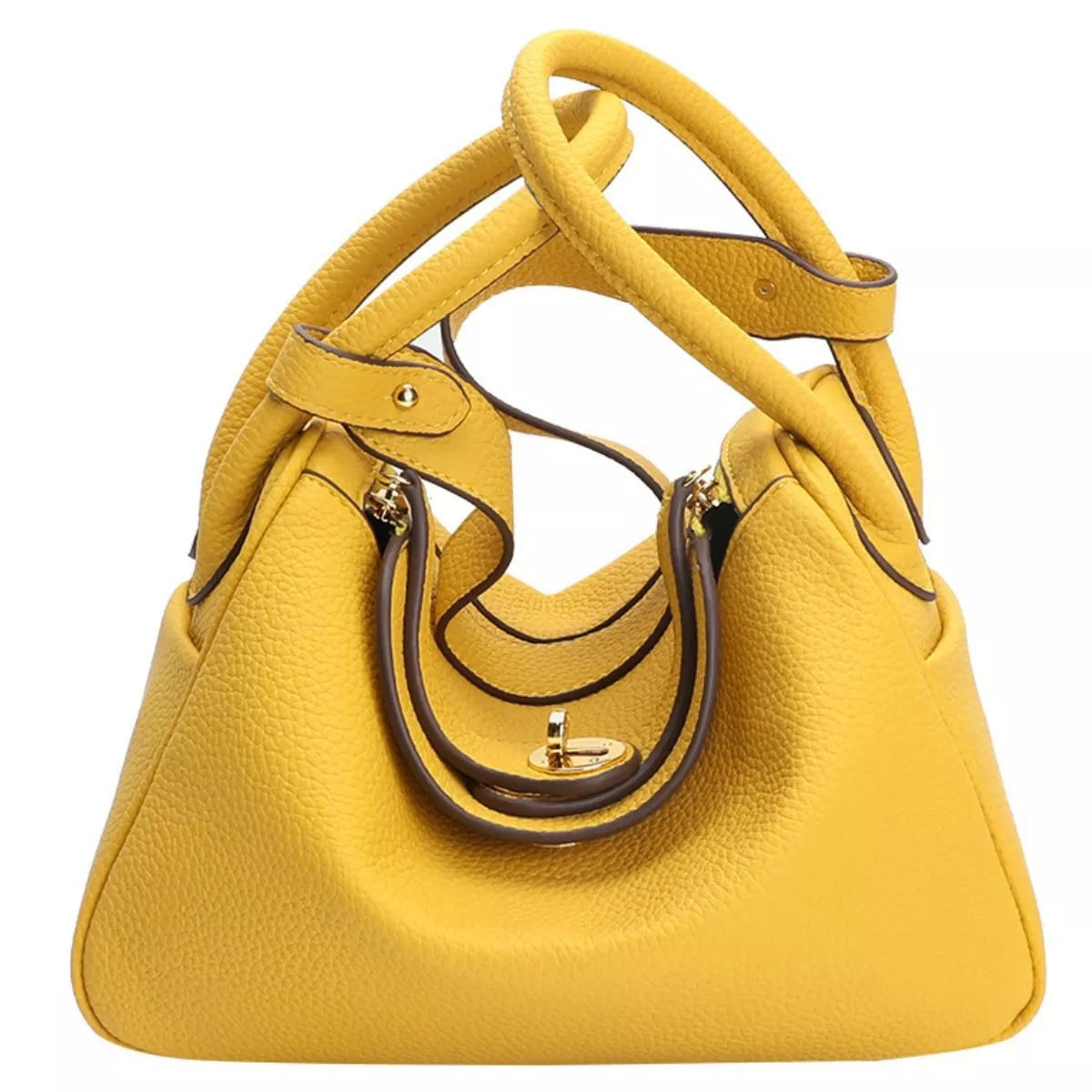 Small yellow textured PU leather handbag with a structured trapezoid silhouette, double top handles, long shoulder strap, dark piping, and gold-tone turn-lock closure.