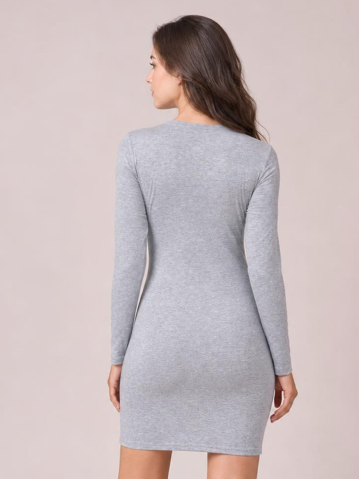 Model shown from the back in a heather gray round-neck long-sleeve mini dress with a fitted, gently shaped silhouette and straight hem.