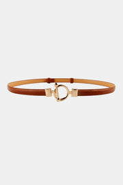 Slim brown PU belt with stitched edges and a distinctive gold-tone toggle buckle, shown in a streamlined skinny silhouette.