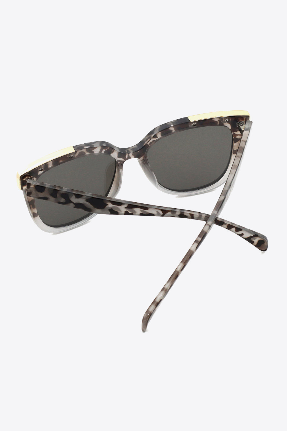 Full-rim square sunglasses in a light gray tortoiseshell polycarbonate frame feature softly rounded lenses, dark gray tint, and crossed temples.