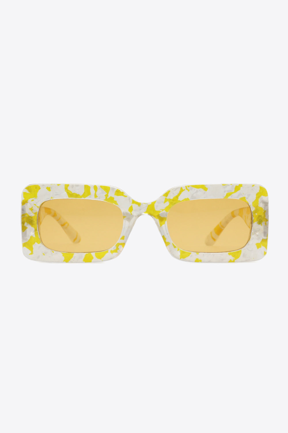 Rectangle polycarbonate sunglasses feature a bold translucent white frame with yellow tortoiseshell-style marbling and warm amber lenses.