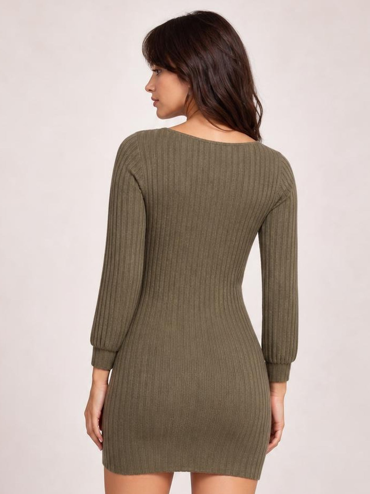 Model shown from the back in an olive brown turtleneck bodycon ribbed knit dress with long sleeves, fitted silhouette, and cuffed wrists.