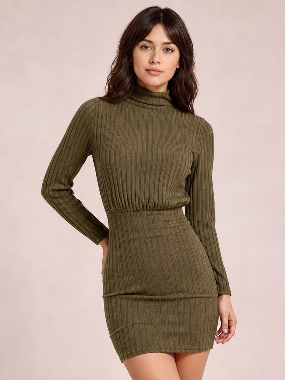 Model poses in an olive green turtleneck bodycon ribbed knit dress with long sleeves, vertical texture, and a fitted mini-length silhouette.