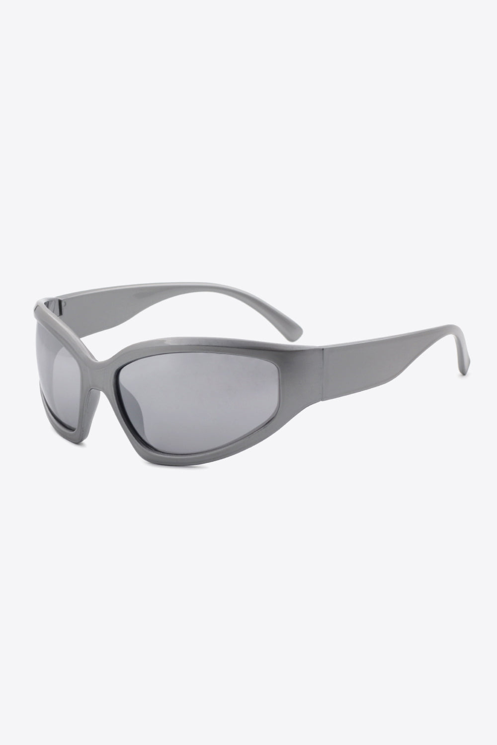 Mid gray UV400 polycarbonate cat-eye sunglasses feature softly curved frames, subtle gray-tinted lenses, and wide streamlined temples for a bold silhouette.