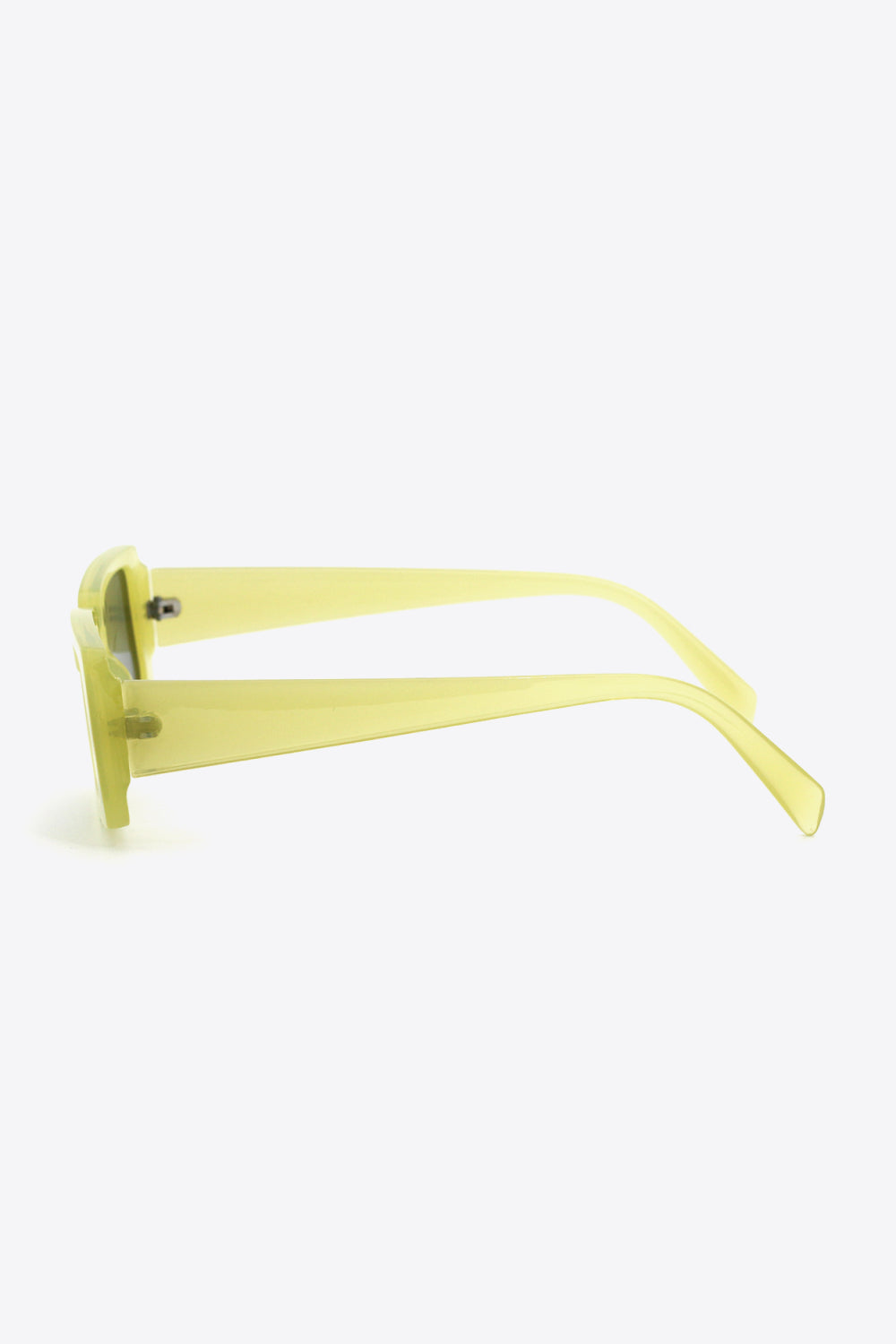 Yellow-green polycarbonate rectangle sunglasses shown in side view, featuring softly squared frames, dark-tinted lenses, and streamlined tapered temples.