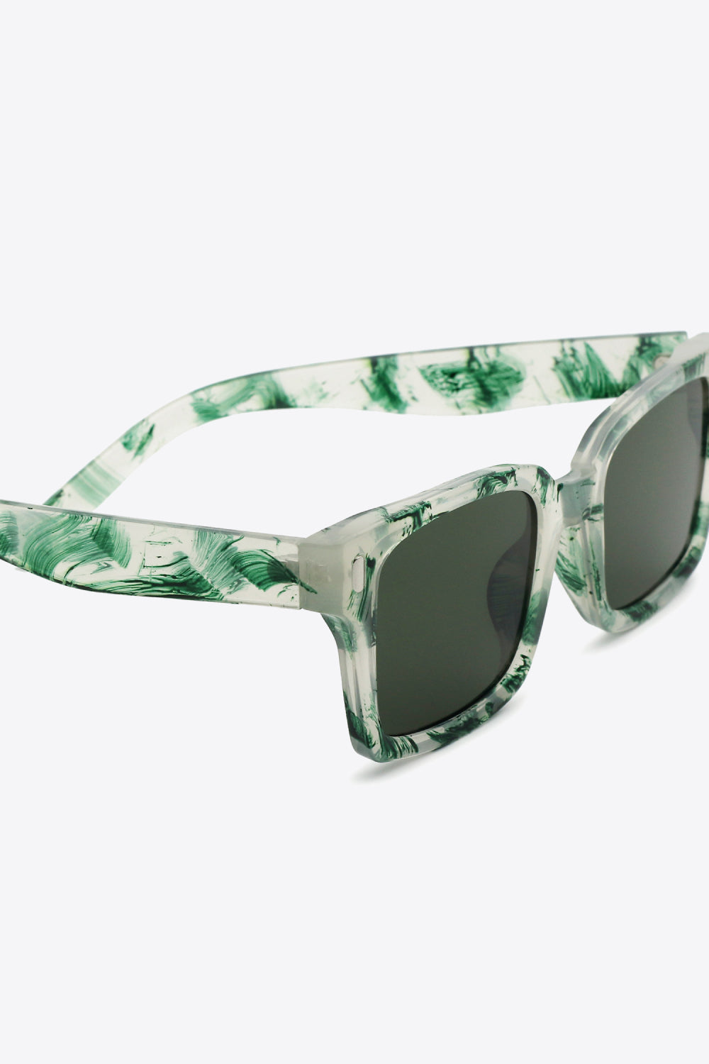 Translucent green marbled UV400 polycarbonate square sunglasses feature broad softly rounded-square frames, dark lenses, and sturdy matching temples.