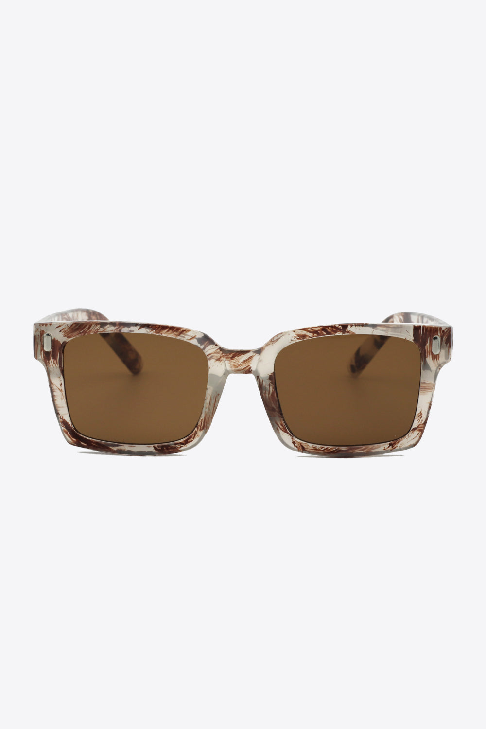These UV400 polycarbonate square sunglasses feature broad softly rounded lenses in warm brown and thick translucent marbled frames for a bold, structured silhouette.