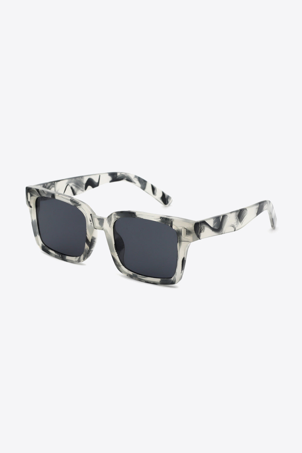 UV400 polycarbonate square sunglasses feature a translucent gray marbled frame, dark lenses, softly rounded corners, and broad temples in a three-quarter view.