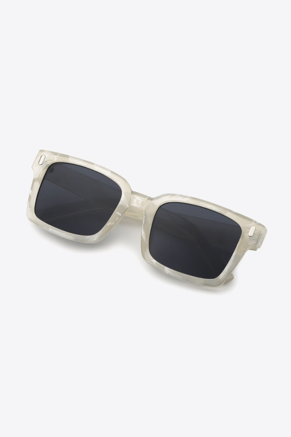 Translucent polycarbonate UV400 square sunglasses feature broad, softly rounded frames, dark lenses, and a substantial modern silhouette.