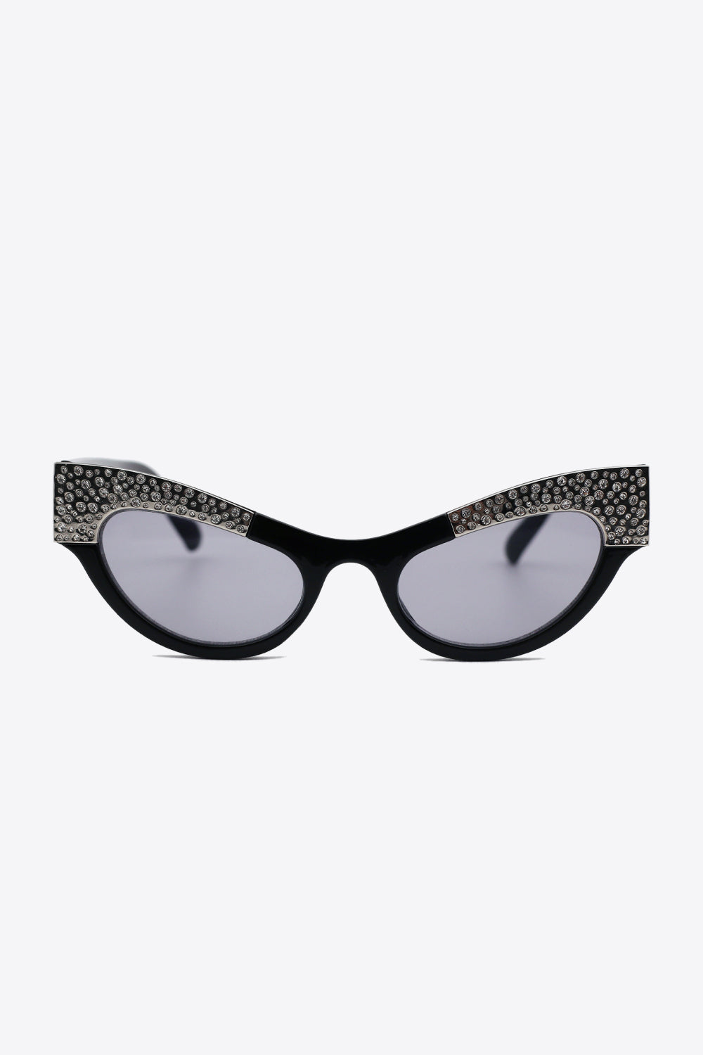 Black cat-eye sunglasses feature sharply lifted corners, gray-tinted lenses, and sparkling rhinestone trim across the upper frame.