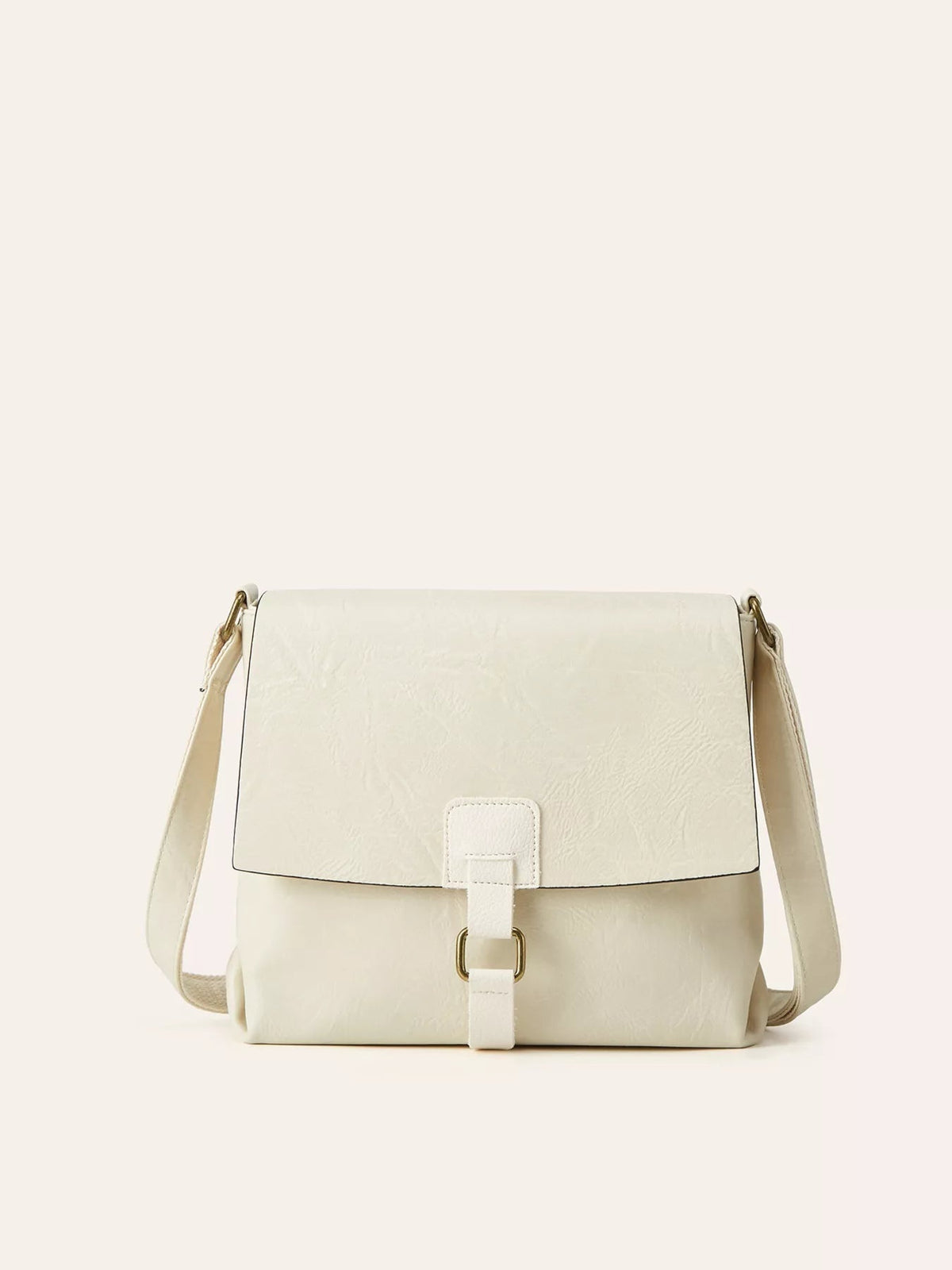 Medium cream PU leather crossbody bag with a structured silhouette, flap closure, adjustable shoulder strap, and vintage gold-tone buckle detail.