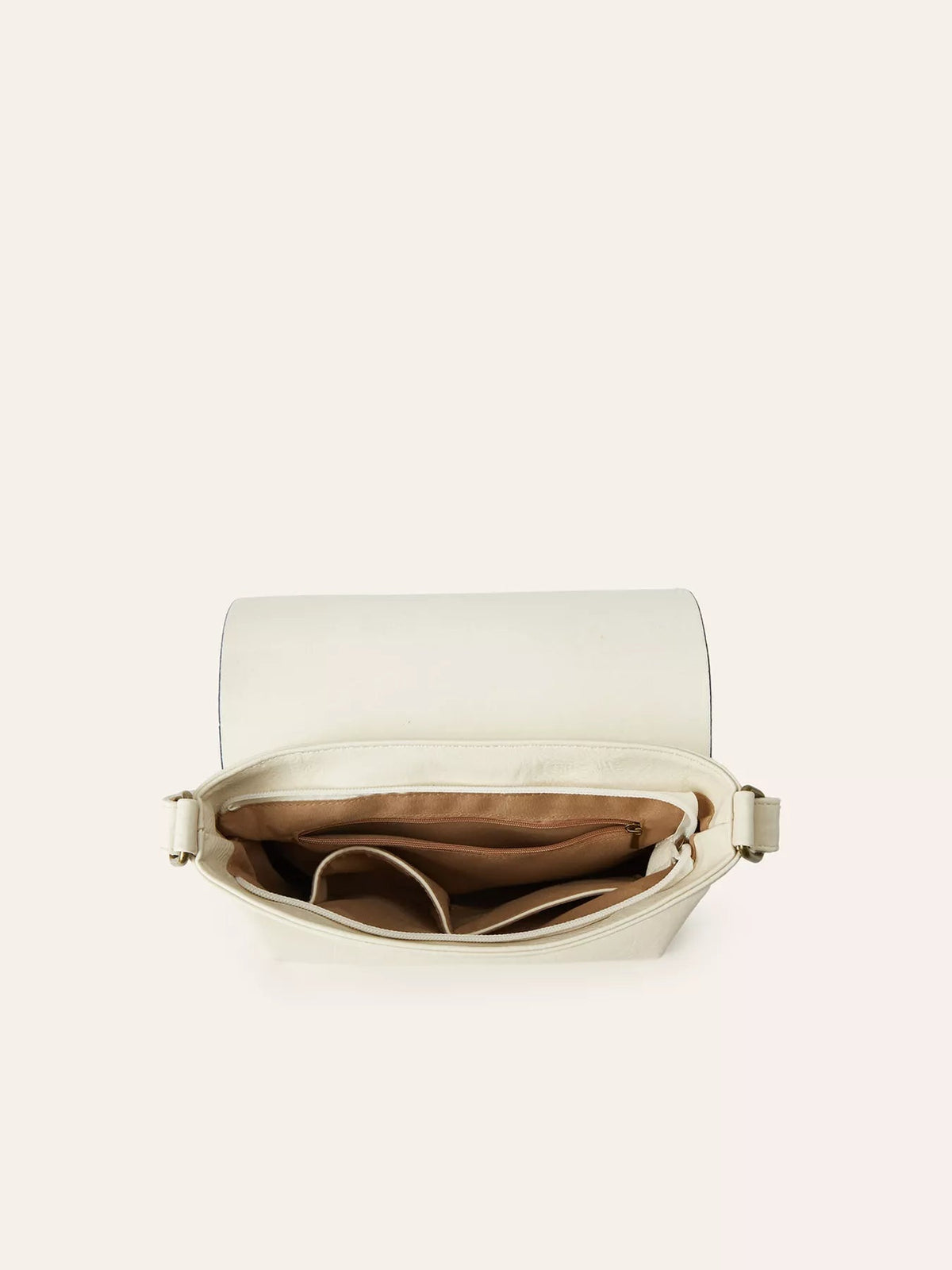 Open medium cream PU leather crossbody bag with a flap, adjustable side straps, spacious compartments, and a brown zippered interior pocket.