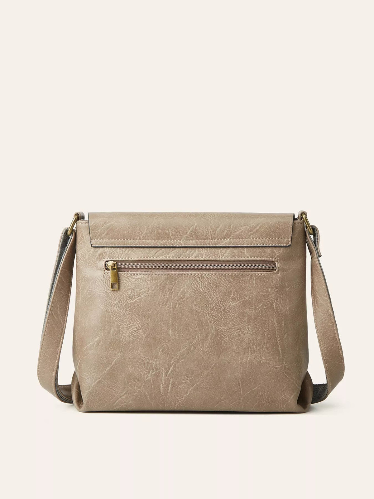 Medium taupe PU leather crossbody bag with a structured silhouette, front flap, long shoulder strap, and horizontal exterior zip pocket.