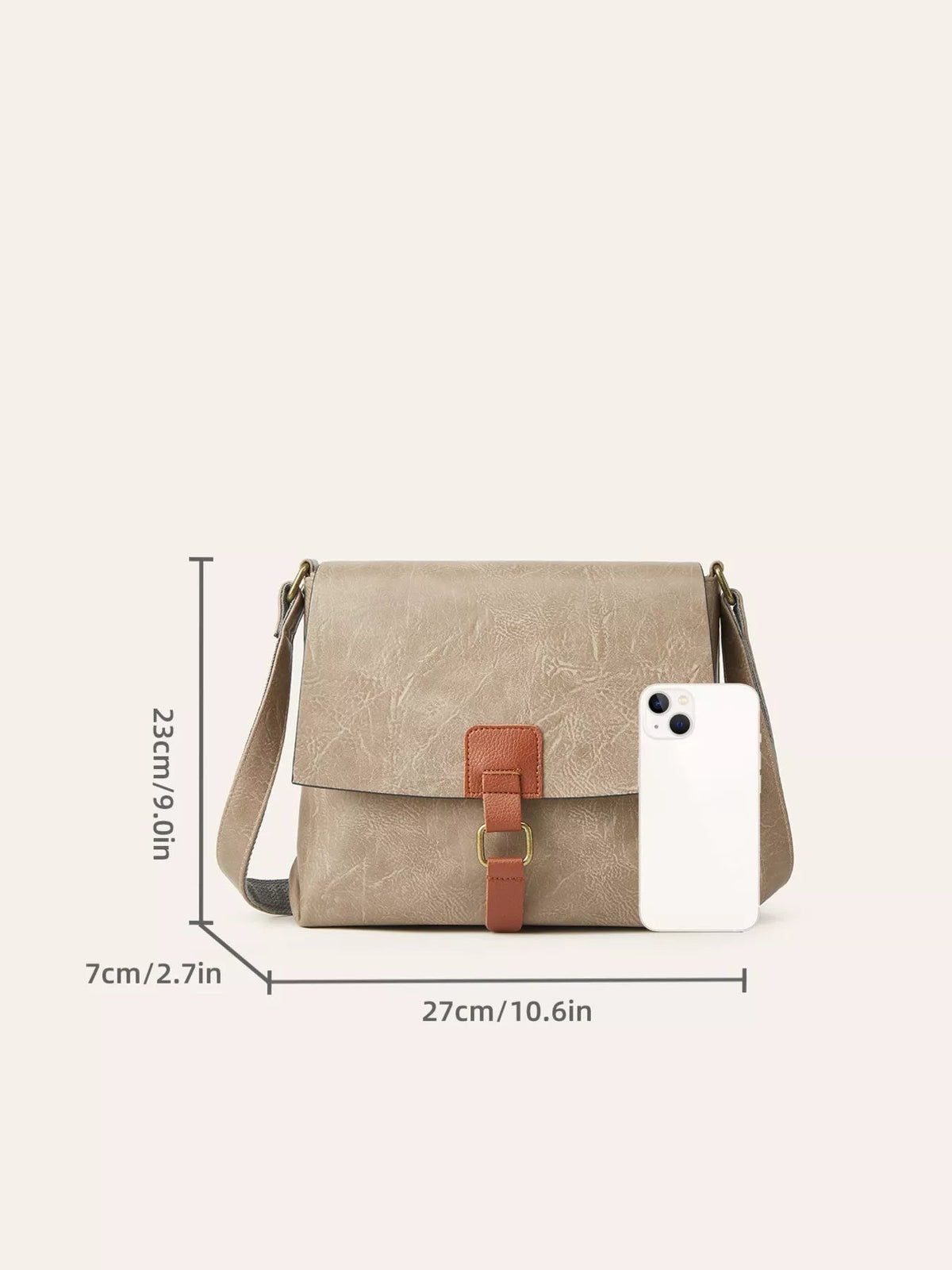 Medium beige PU leather crossbody bag with a vintage flap design, adjustable shoulder strap, and brown buckle closure on the front.