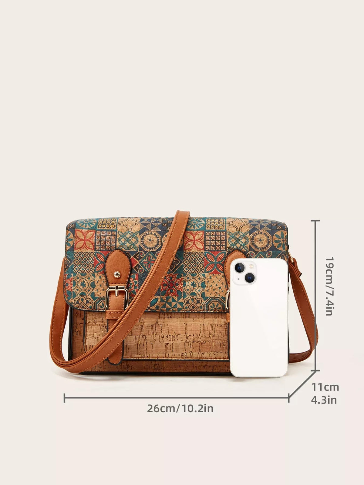 Medium vintage-pattern PU leather crossbody bag with a colorful geometric patchwork flap, brown adjustable strap, and structured rectangular silhouette.