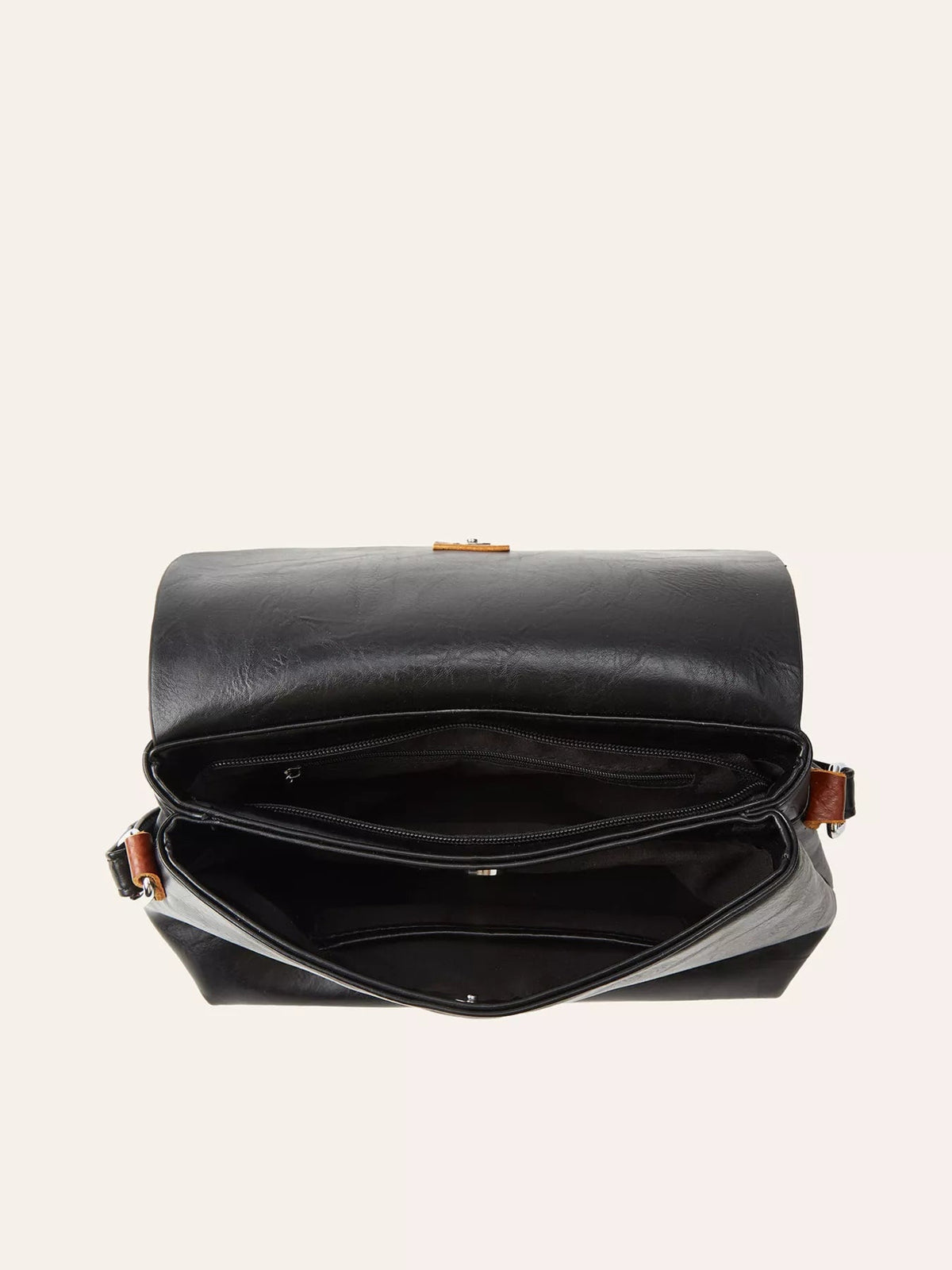 Black vintage PU leather flap crossbody bag shown open, revealing a structured silhouette with multiple spacious compartments, zippered sections, and a front clasp.