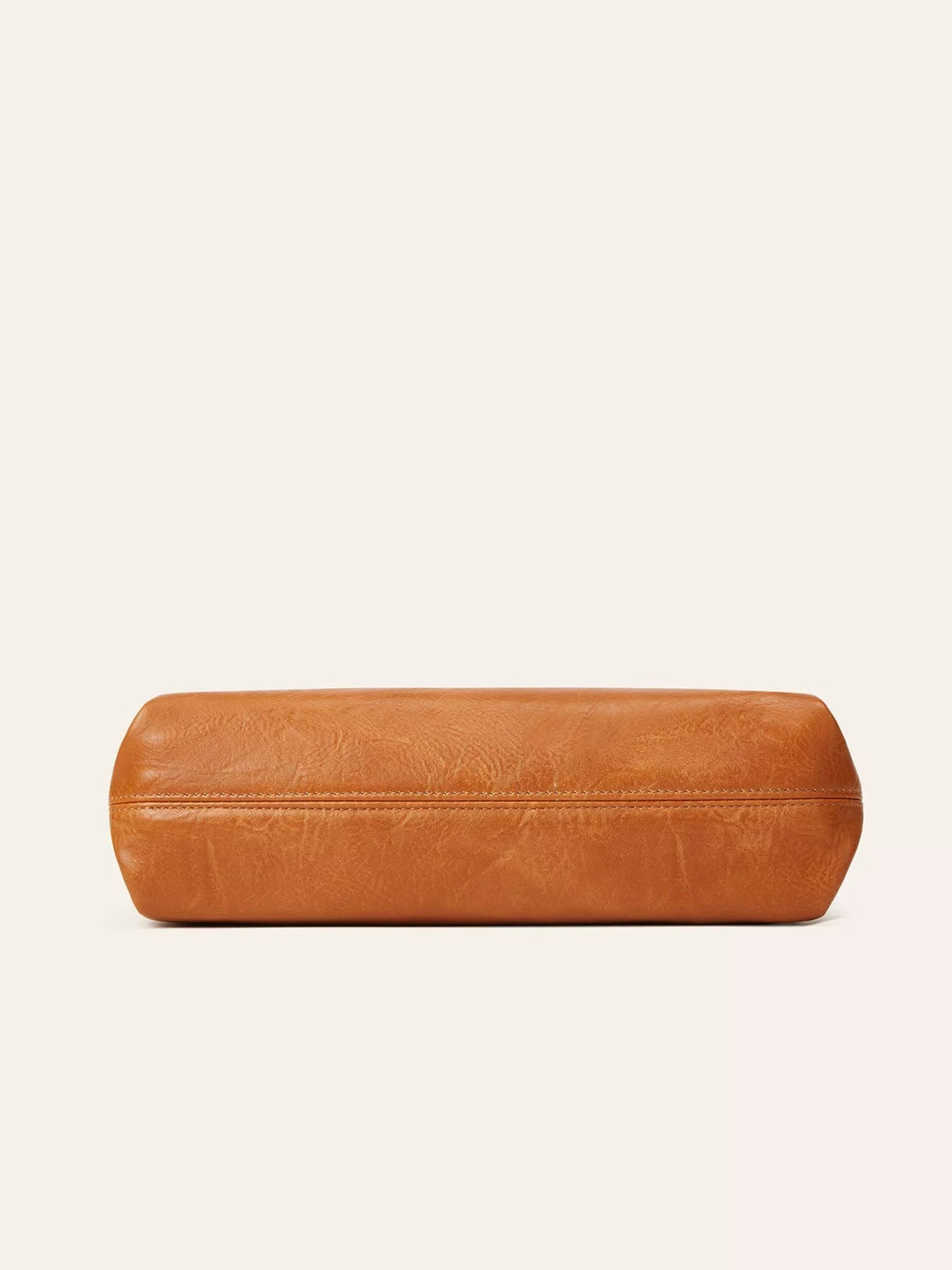 Medium vintage-style PU leather bag in warm brown, shown from the base with a rounded rectangular silhouette and neat stitched seam.