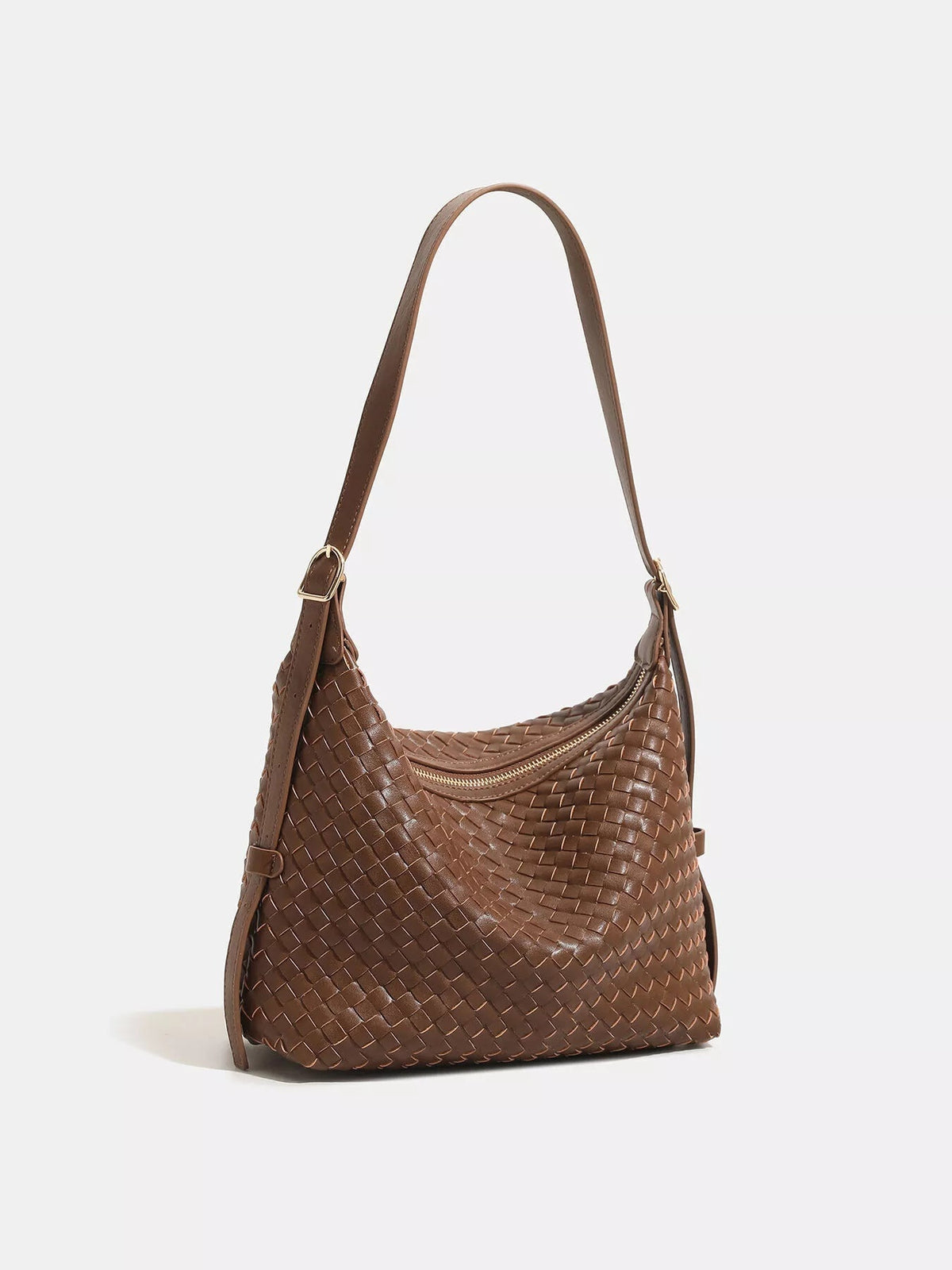 Medium brown woven PU leather shoulder bag with a slouchy silhouette, adjustable strap, gold-tone hardware, and a top zip closure.
