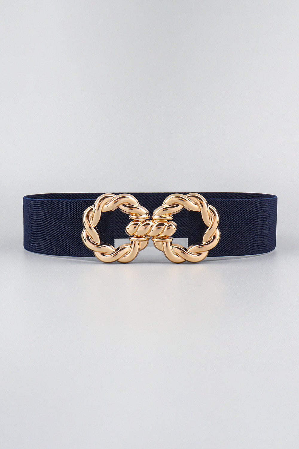 A 2-inch-wide navy elastic belt features a statement gold-tone zinc alloy buckle with ornate interlocking curves and a sleek, flattering silhouette.