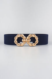 A 2-inch-wide navy elastic belt features a statement gold-tone zinc alloy buckle with ornate interlocking curves and a sleek, flattering silhouette.