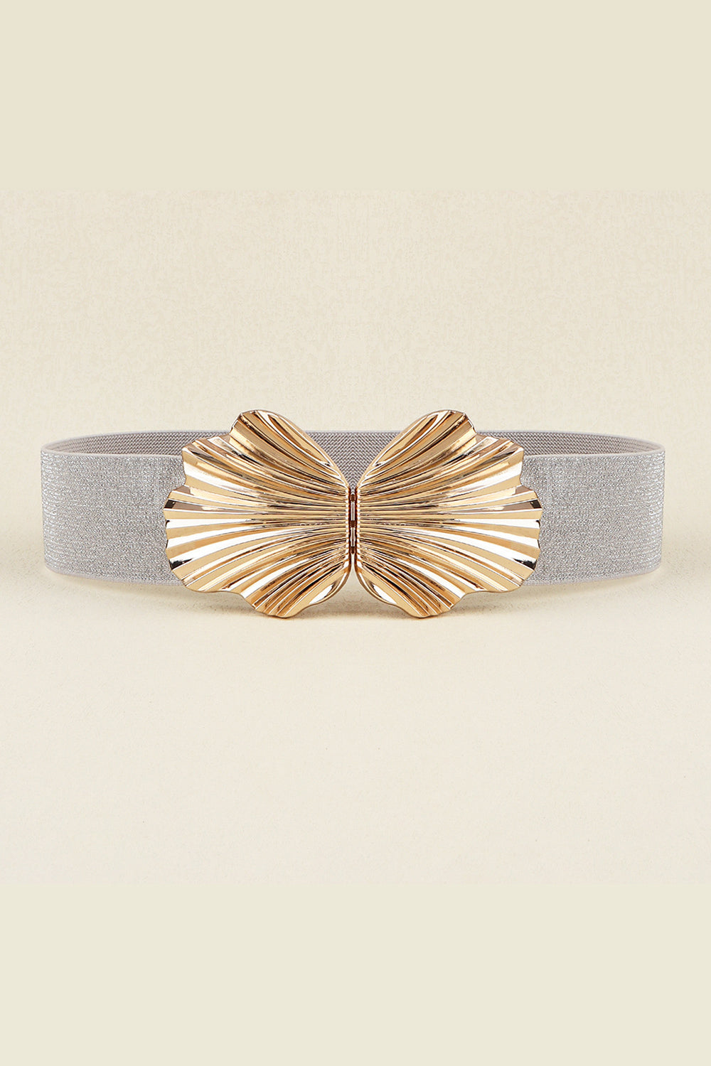 Silver elastic belt with a sculptural gold-tone zinc alloy buckle featuring butterfly-inspired fan detailing and a wide, polished statement silhouette.