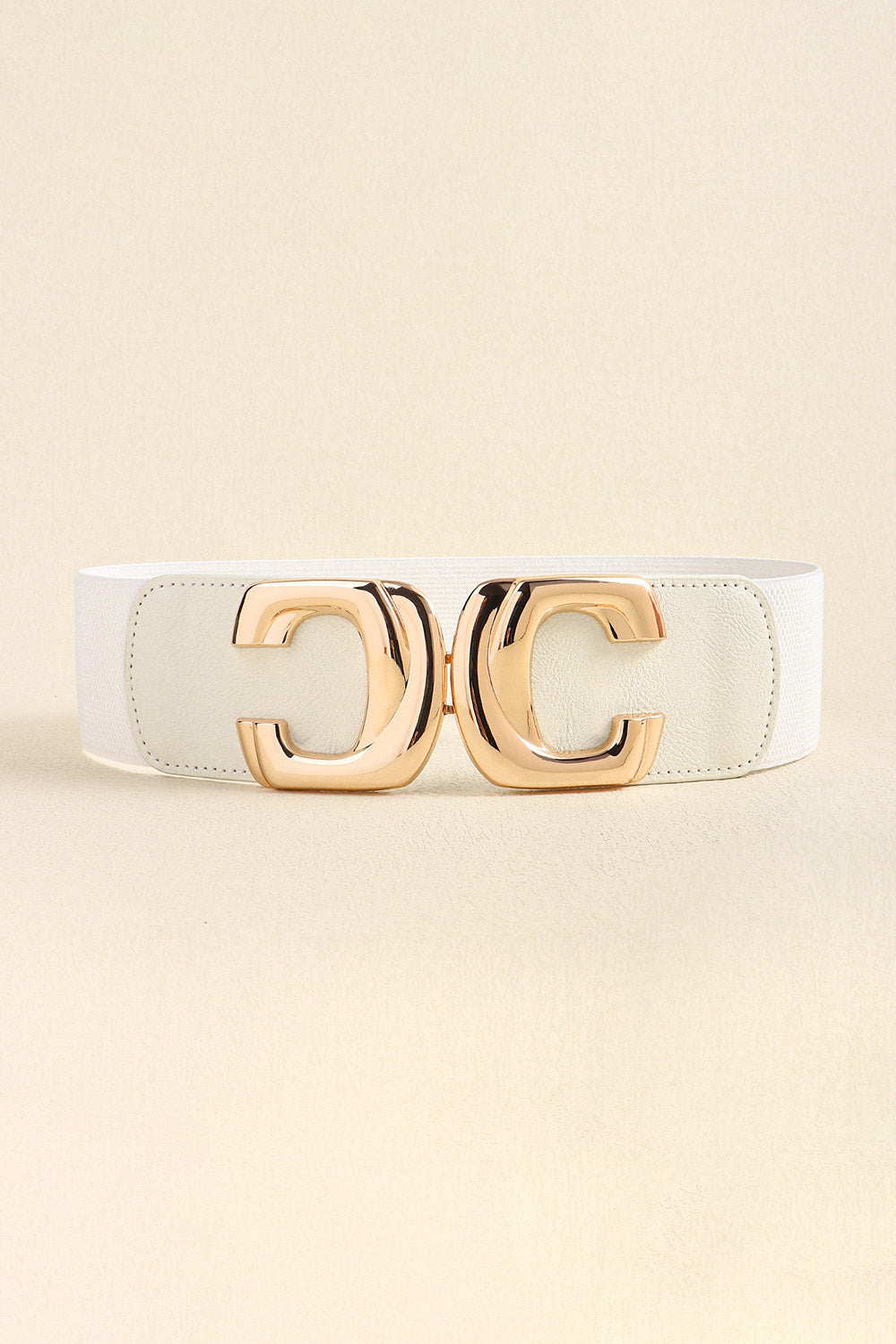 White wide elastic belt with a structured PU band and oversized gold-tone zinc alloy double-loop buckle for a polished statement silhouette.