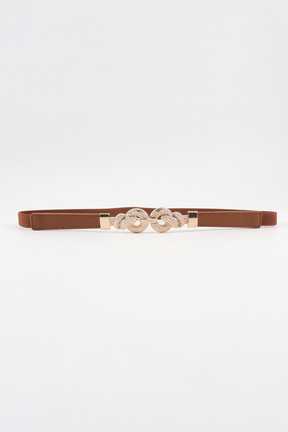 Slim brown PU leather belt with a sleek 0.6-inch silhouette and ornate zinc alloy buckle featuring rounded interlocking details.